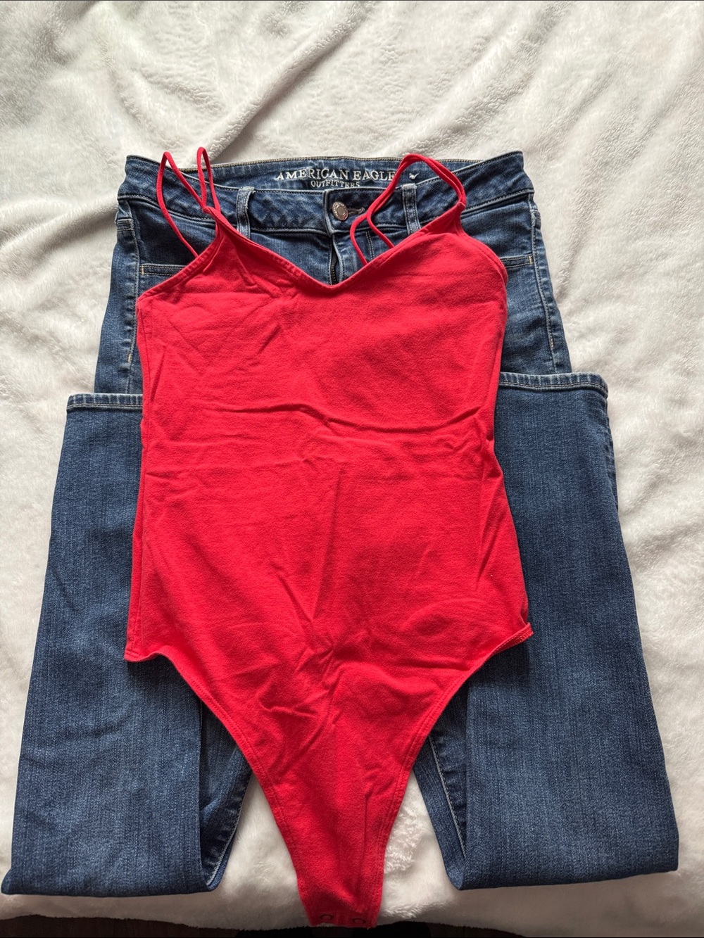 American Eagle Outfitters Red Spaghetti-Strap Bodysuit w pair of skinny jeans